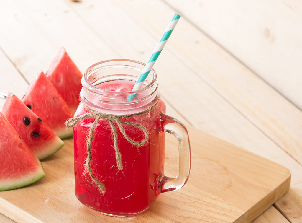 watermelon smoothie on wood background